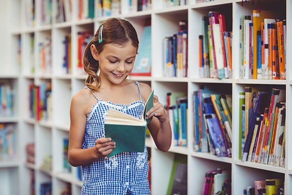 Happy kid reading